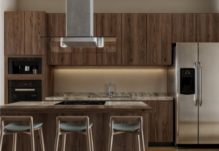 Cocina integral moderna de madera y acero inoxidable en departamento Almerana de Vigía Sky Tower.