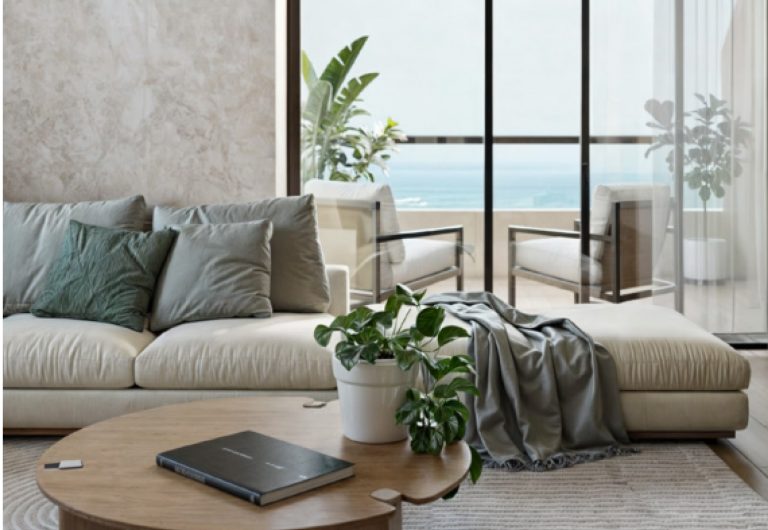 Sala del modelo Fuegirola en Vigía Sky Tower con vista al mar, decoración minimalista y acceso a terraza.