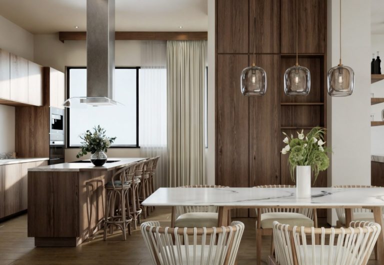 Cocina y comedor del modelo Fuegirola en Vigía Sky Tower, diseño moderno con barra desayunadora y lámparas colgantes.